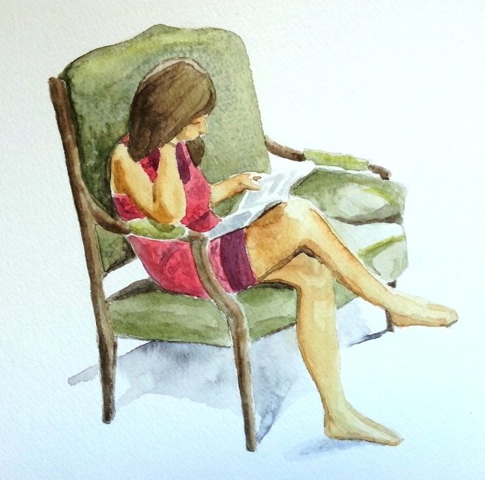 Jeune fille assise en train de lire